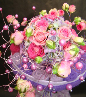 bouquet de la mariée rose et parme formé de roses